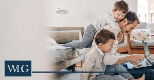 children playing while dad tries to work