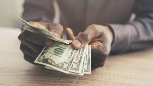 person counting money